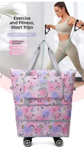 Detail of unicorn print travel bag with double-layer expansion and 4 spinning wheels