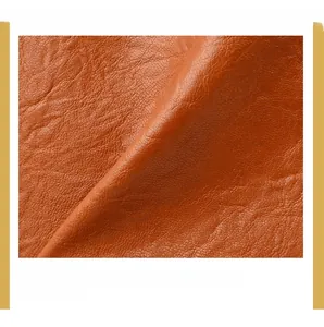 Close-up of brown litchi pattern leather showing refined texture and durability