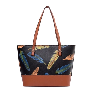 Black leather tote bag with colorful feather print and brown handles in a trapezoid shape