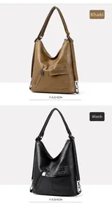 Detail of khaki and black vintage leather tote bags with rivets and adjustable straps