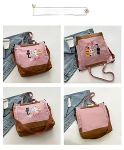 Detailed views of pink canvas tote bag with cartoon cat prints and adjustable straps
