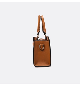 Detailed side view of brown lychee grain leather handbag with gold D-ring and zipper