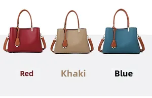 Three multi-set tote bags in red, khaki and blue with pebbled leather and gold hardware