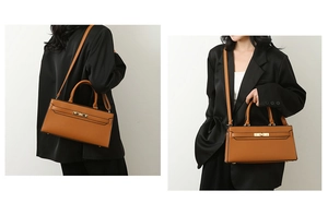 Detailed view of caramel leather handbag with lychee pattern and gold twist lock