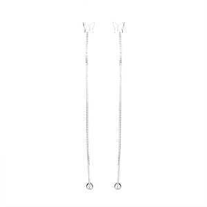 Detailed view of silver butterfly tassel earrings with fine long chain drops and metal beads