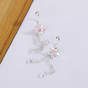 Detail of silver cherry blossom earrings with pink zircon and dangling tassel chains