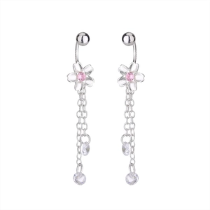 Detail of silver cherry blossom navel ring with pink zircon and dangling crystal tassels