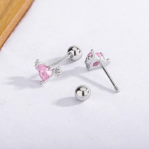 Detail of pink heart earring with angel wings and secure screw-back ball closure