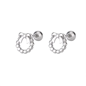 Detailed close-up of S925 silver bow stud earrings with secure screw back closure
