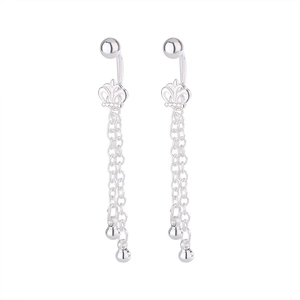 Detail view of silver crown navel rings with long chain tassels and polished bead charms