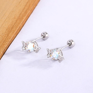 Macro detail of silver butterfly stud earring with aurora stone and screw ball back