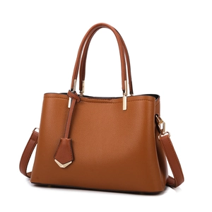 Brown litchi grain leather tote bag with dual handles and gold hardware on white background