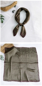 Detail of olive green leopard print satin silk square scarf showing tie and flat view