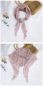 Close-up of pink lace triangle scarf featuring intricate floral crochet textures