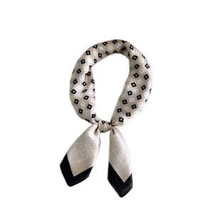 Elegant champagne silk square scarf with geometric diamond pattern and black borders