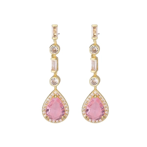 Detail showing pink pear-cut gemstone drop earrings with golden metal and clear zircons