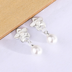 Elegant flower and pearl drop earrings in silver metal finish for women