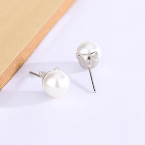 Creative cat ear pearl earrings featuring elegant round pearls in a silver-tone setting