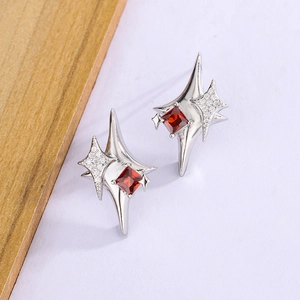 Chic silver four-pointed star earrings with red zircon and sparkling crystal accents