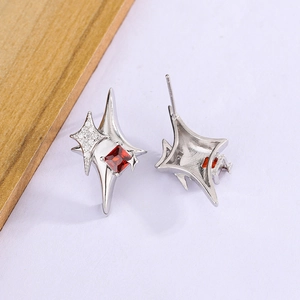 Star-shaped S925 silver earrings featuring a central red zircon and tiny crystal accents
