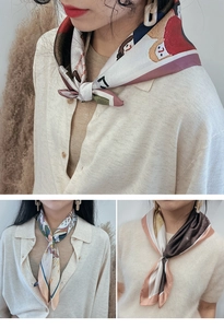 Detailed view of elegant printed square silk scarves in various artistic patterns