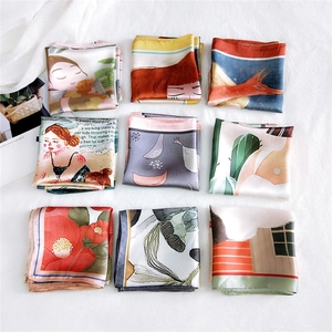 Detailed grid view of nine square silk scarves featuring artistic floral and fox patterns