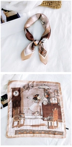 Detail of artistic illustration silk scarf featuring vintage clock and girl motif