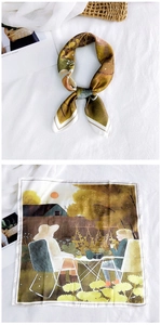 Detail of square silk scarf with vintage garden illustration and hand-rolled edges