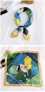 Detailed view of hand-painted silk square scarf with colorful tropical illustration