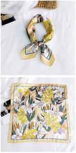 Detailed view of yellow floral silk square scarf with satin finish and digital print