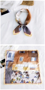 Artistic silk square scarf detail featuring an outdoor cafe scene illustration