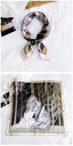 Detail of square silk scarf showing hand-drawn forest and girl illustration print