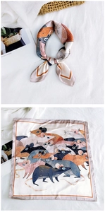 Detail of square silk scarf with whimsical colorful mice print and knotted styling