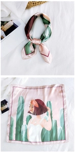 Detail view of pink square silk scarf with cartoon girl and cactus pattern prints