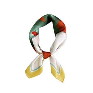 Silk-like square scarf with abstract geometric print in green, orange, and yellow hues