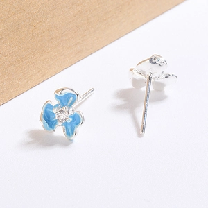Elegant blue iris flower stud earrings with enamel petals and central zircon stone