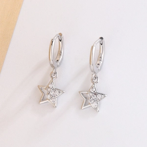 Close-up of S925 sterling silver star drop earrings with sparkling cubic zirconia inlay