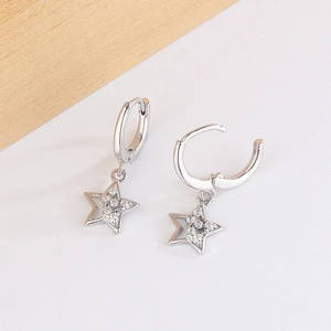 Detailed close-up of S925 silver star hoop earrings with sparkling cubic zirconia inlay