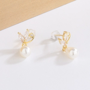 Elegant butterfly gold pearl drop earrings with sparkling marquise crystal accents