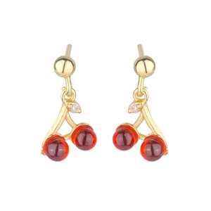 Detail of sweet cherry drop earrings with red translucent beads and gold stems