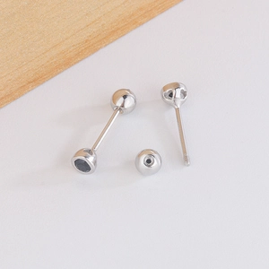 Minimalist silver geometric stud earrings with black round gems and screw ball backs