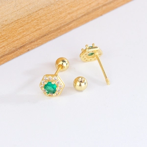 Detailed view of hexagonal emerald stud earrings with secure gold screw back closures