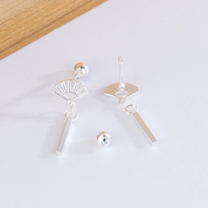 Detailed close-up of fan-shaped stud earrings featuring S925 silver hallmarks and tassels
