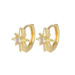Golden eight-pointed star hoop earrings with sparkling zircon inlay on white background