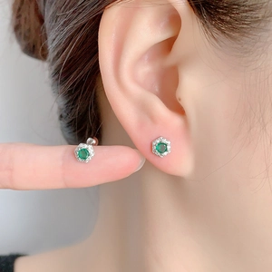 Vintage hexagonal emerald zircon stud earrings in silver with a secure screw-back ball