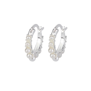 Minimalist silver hoop earrings with elegant inlaid pearls on a clean white background