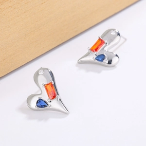 Minimalist silver heart stud earrings with colorful zircon stones in a modern design