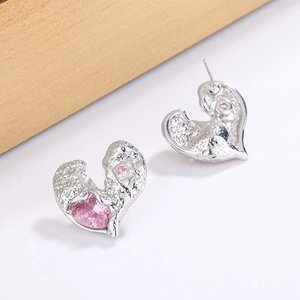 Pink heart stud earrings with silver hammered texture and sparkling zircon stones