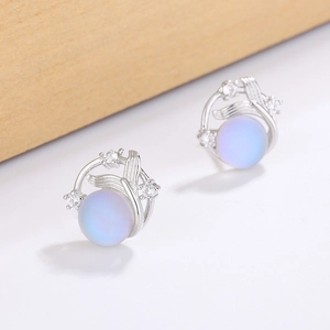 Starry planet fishtail earrings with blue moonstone and zircon in silver setting