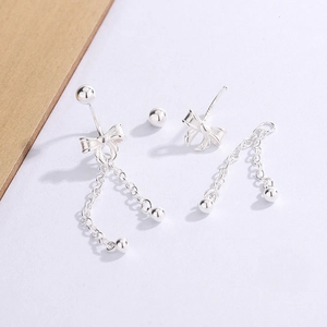 Elegant silver butterfly tassel earrings with hanging chains for a minimalist chic style